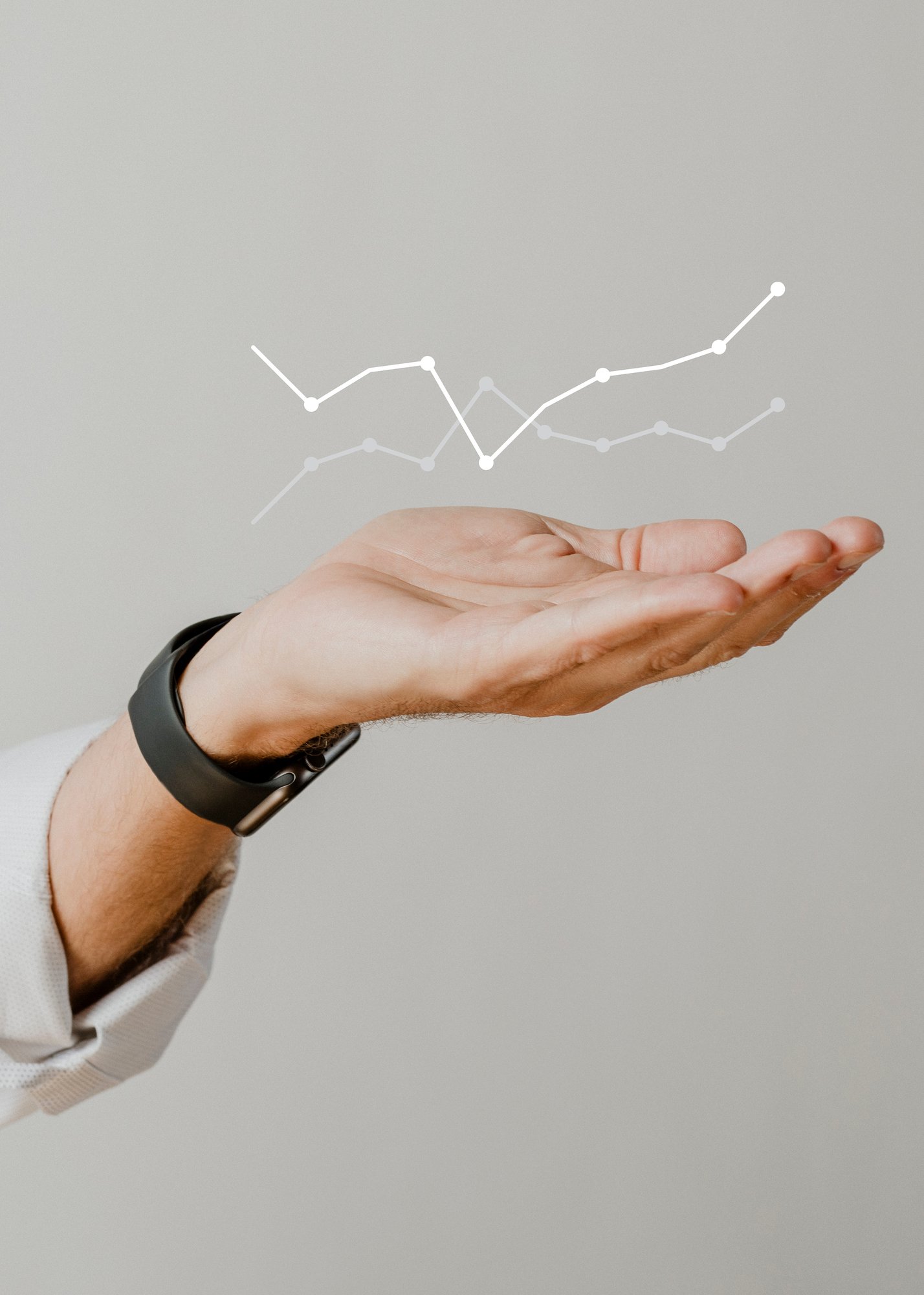 digital-graph-performance-with-businessman-hand-overlay